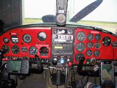 Old photo of the very first trial installation of HP iPAQ 4705 with NavAir software, Holux GR-231 Bluetooth GPS, and WxWorx XM Weather receiver on the right side, Garmin GPS 196 on the left. In smooth air, I prefer the ease of use of the touchscreen on the Windows Mobile device.  But in rough air, it is easier to manipulate buttons than a touchscreen. IMG_2181.jpg